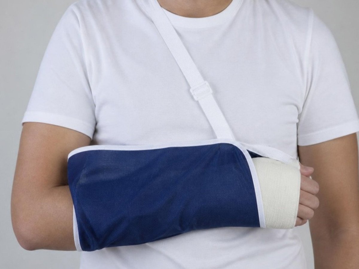 Arm in a sling, fracture first aid